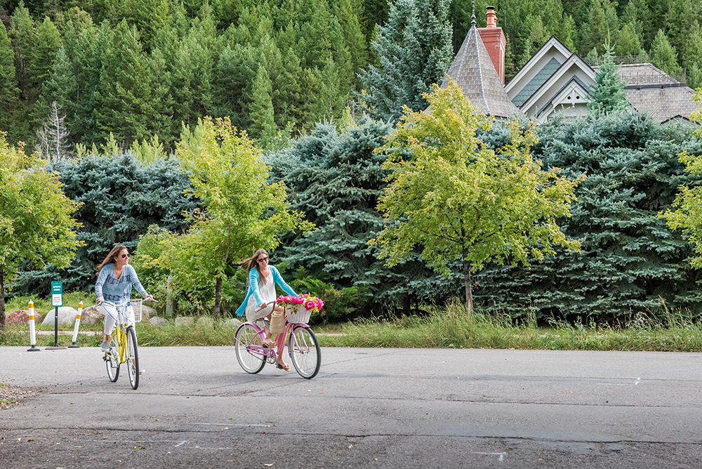 Two girls cruiser biking in Aspen