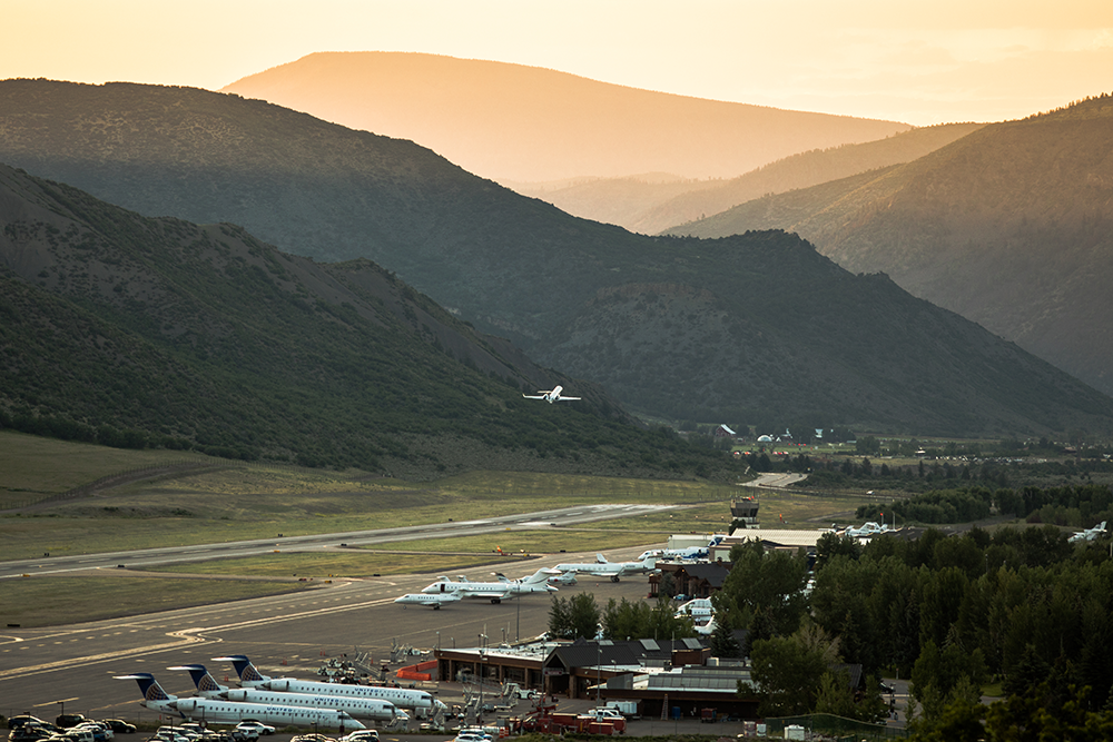 Aspen Airport plane takeoff in the summertime 