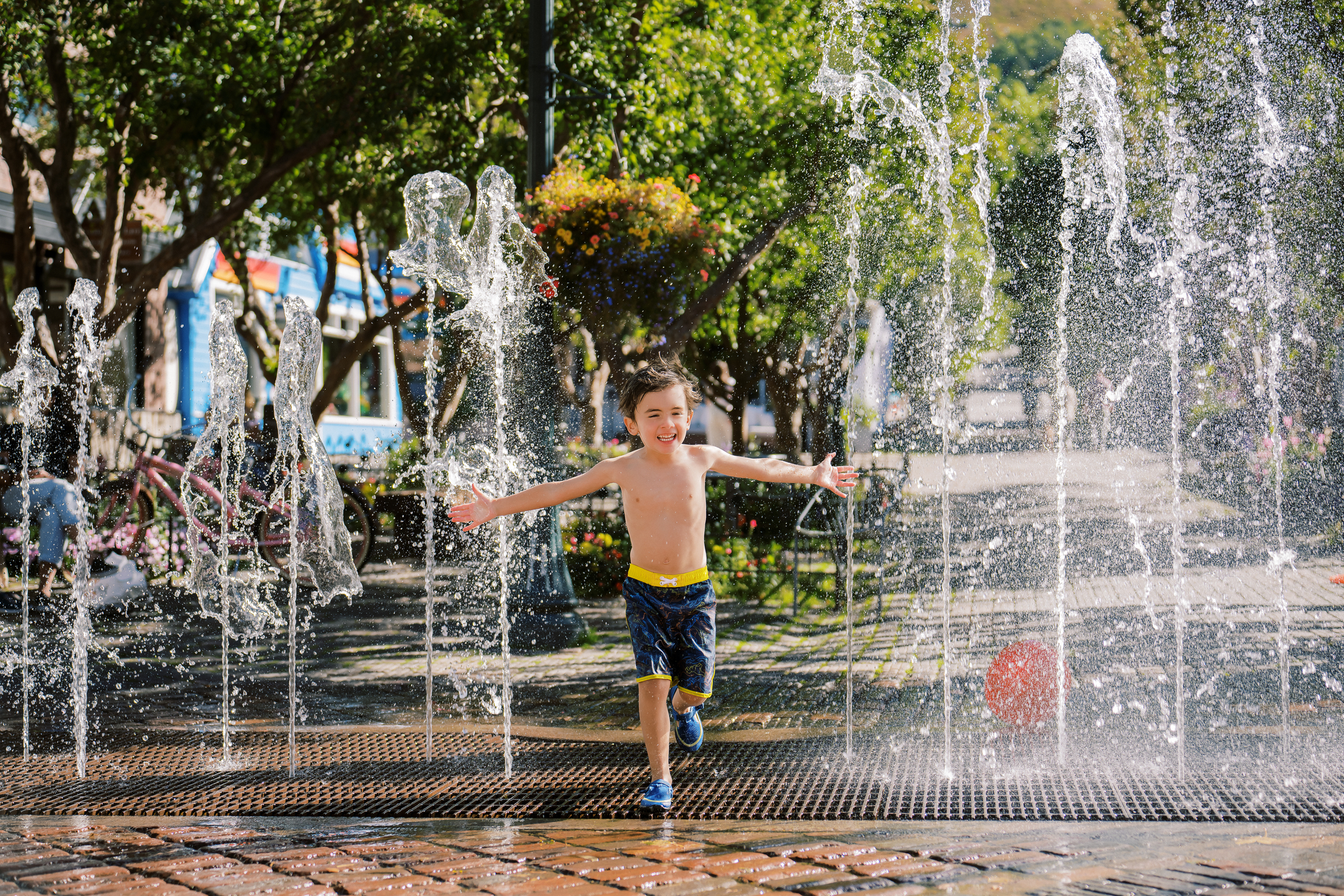 Kids playing in Aspen's downtown fountain