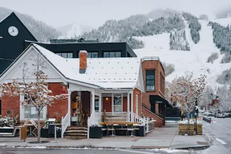 business in downtown aspen in the winter with snow